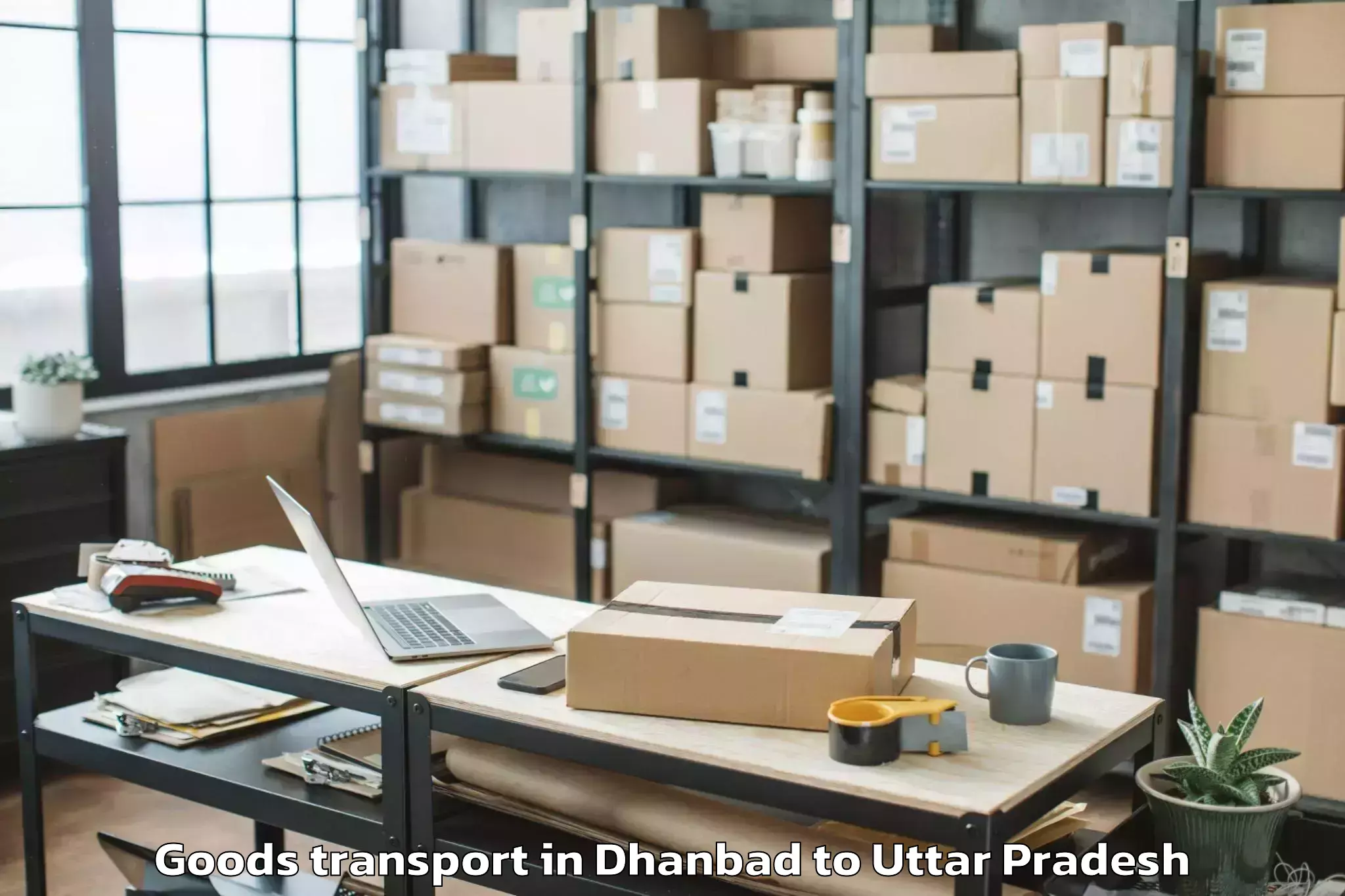 Book Your Dhanbad to Amausi Airport Lko Goods Transport Today